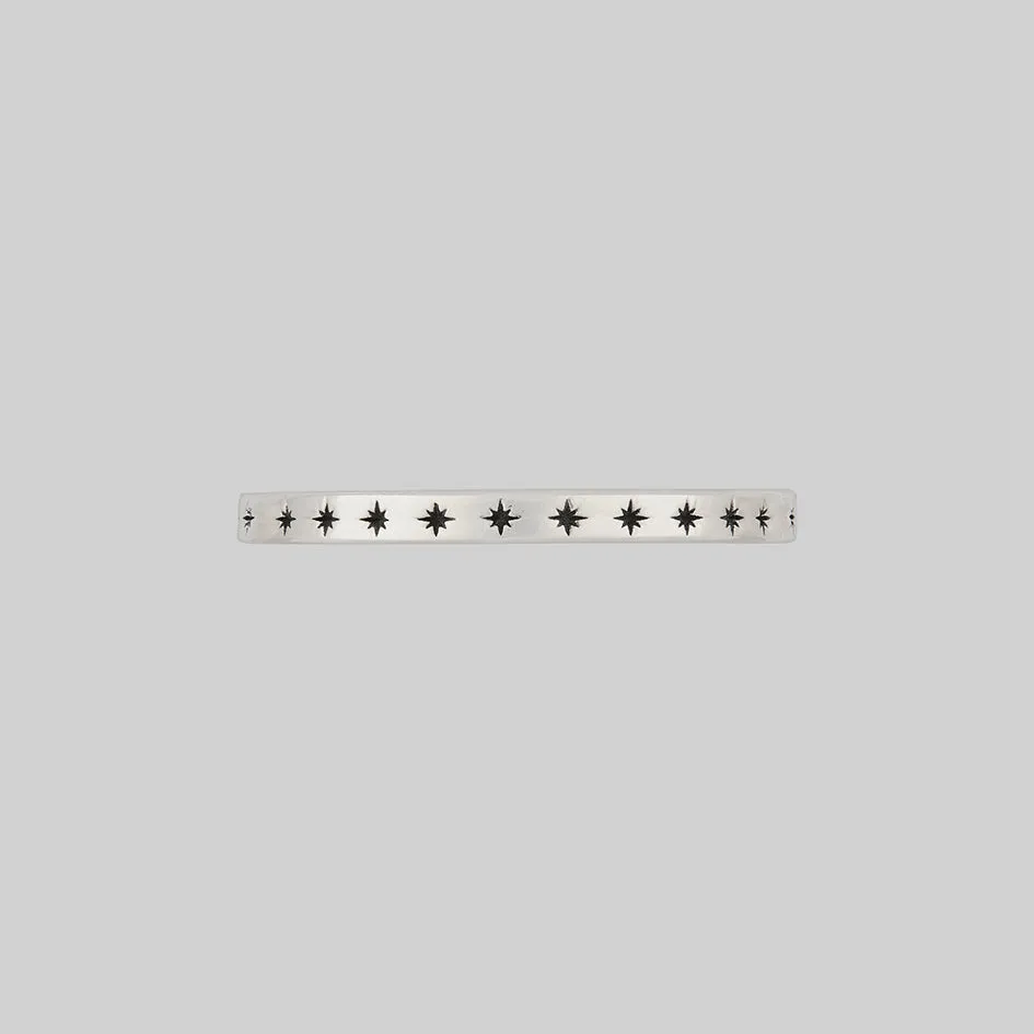 Delicate Silver Stacking Ring with Star Design