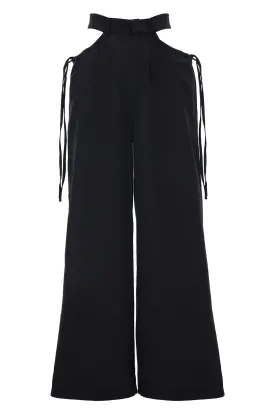 TROUSERS WITH OPENINGS